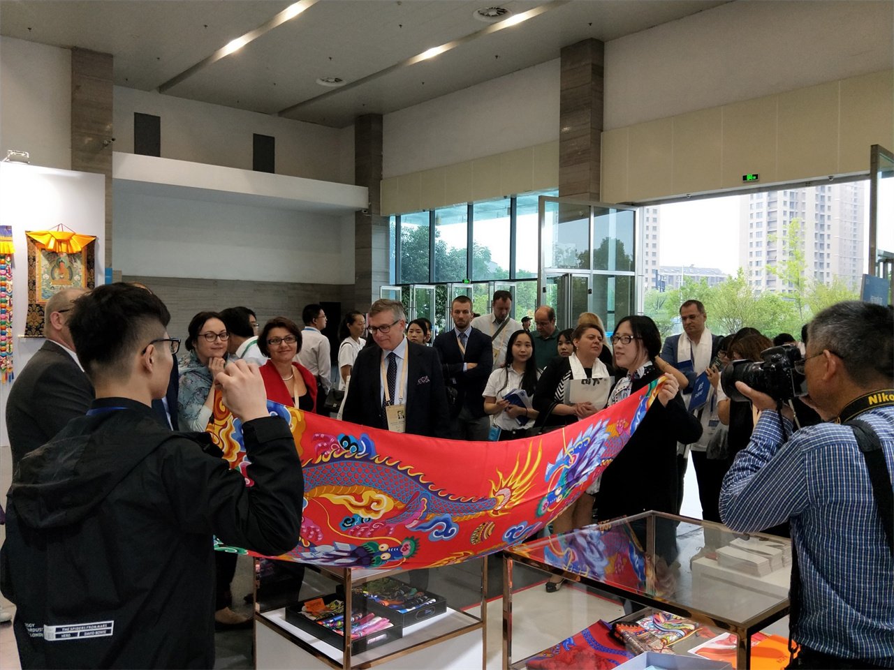 Cultural ministers and ambassadors from Central and Eastern European countries visit the booth at Aurora Cultural Expo