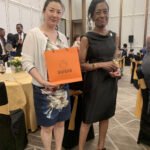 The current Ambassador of the Bahamas to China, His Excellency Bethel, is standing on the Aurora platform for the National Silk Road